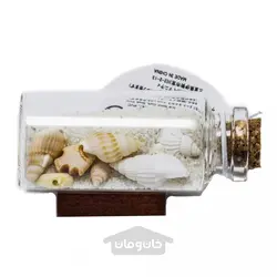 بطری افقی حاوی شن