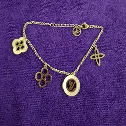 دستبند زنانه طرح گل و دایره