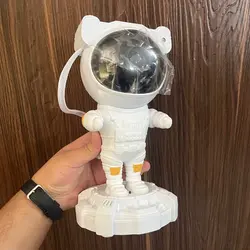 پروژکتور (رقص نور لیزری) کهکشانی آسمان پر ستاره طرح فضانورد اسپیکردار | Astronaut Speaker - بازرگانی ماکسیس-ایران ماکسیس