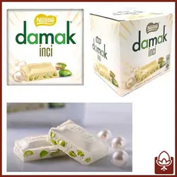 شکلات تخت سفید پسته ای داماک - 60 گرمی - فروشگاه فندو