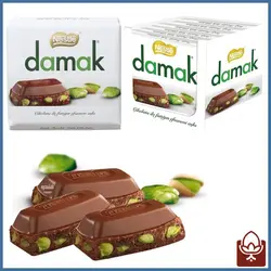 شکلات تخت شیری پسته ای داماک - 60 گرمی - فروشگاه فندو
