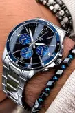 ساعت مچی مردانه بند استیل نقره ای اصل ضد آب 50 متری + دستبند کد FAVORİCS0017 برند Casio
