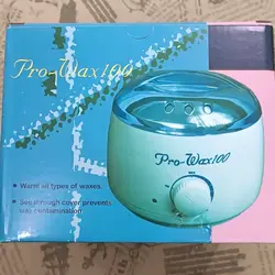 دستگاه مومگرمکن اپیلاسیون وکس وارمر wax warmer موم گرمکن دستگاه وکس اپیلاسیون شمع صورت گرمکن موم بدن موم پروین سکه ای   