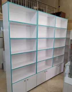 قفسه و طبقه بندی ام دی اف فروشگاهی و اداری و میز و ویترین اهواز قفسه بندی و دکور مغازه