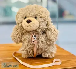 عروسک سگ قلاده دار پشمالو
