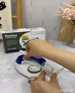 اتو بخار دسته تاشو مسافرتی کوچک