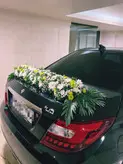 ماشین عروس دنا مشکی فلوبار