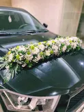 ماشین عروس دنا مشکی فلوبار