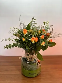 گل رز مینیاتوری داخل جار گل فلوبار