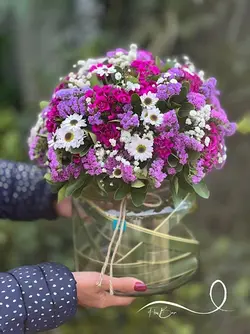 گل بنفش داخل جار گل فلوبار