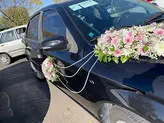 ماشین عروس دنا مشکی فلوبار