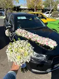 ماشین عروس دنا مشکی فلوبار