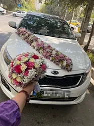 ماشین عروس اپتیما سفید فلوبار