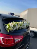 ماشین عروس اسپورتیج مشکی فلوبار
