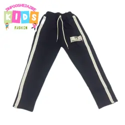 شلوار مشکی راسته بچگانه بغل نواردار - جین پوش جزیره