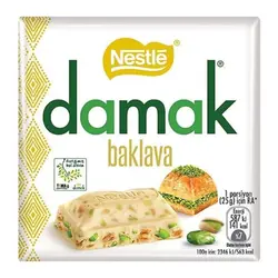 شکلات سفید داماک نستله با مغز باقلوا و پسته 60 گرم