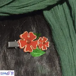 گیره سر طرح گل قرمز