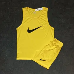 ست تاپ حلقه ای و شلوارک بدنسازی مردانه نایک زرد