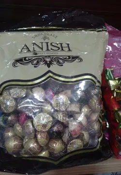 شكلات آنيش پرتقالي با روكش كاكائویی و مخلوط میوه و لوکس، 2 کیلویی