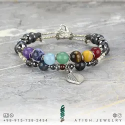 دستبند هفت سنگ چاکرا معدنی سری سنگ های قیمتی بینظیر همراه صدف مشکی-سفید طبیعی ، حدید و گارنت معدنی