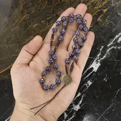 تسبیح کلکسیونی چاروئیت (Charoite) معدنی با رگه های خاص 33 دانه درشت دستساز اسلیمی بافت مکرومه