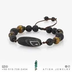 دستبند مهره لول عقیق سیاه سلیمانی مات طرح قدیمی با نقوش زیبا همراه چشم ببر و لاوا طبیعی بافت کشویی فری سایز