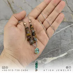 گردنبند فیروزه نیشابوری شجری دور قاب نقره 925 عیار و چشم ببر تراش نامنظم معدنی زنجیر استیل کیفیت سنگ عالی