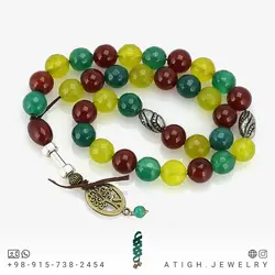 تسبیح میکس عقیق سبز زمردی تراش دار، عقیق سرخ شفاف و خوشرنگ همراه جید سبز زبرجدی تراش دار معدنی کیفیت عالی ۳۳ دانه دستساز کرکوش درخت زندگی طراحی اسلیمی