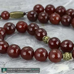 تسبیح عقیق سرخ معدنی مرغوب بسیار خوشرنگ تراش لانه زنبوری 33 دانه دستساز