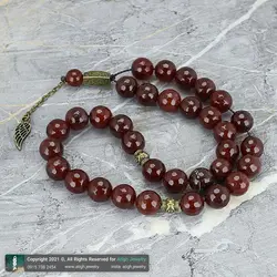 تسبیح عقیق سرخ معدنی مرغوب بسیار خوشرنگ تراش لانه زنبوری 33 دانه دستساز