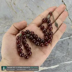 تسبیح عقیق سرخ معدنی مرغوب بسیار خوشرنگ تراش لانه زنبوری 33 دانه دستساز
