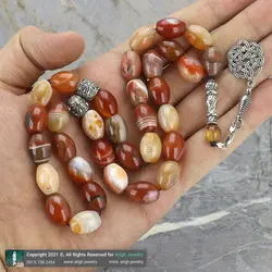 تسبیح کلکسیونی عقیق کارنلین سلیمانی معدنی با نقش و نگار زیبا دانه درشت تراش هلی 33 دانه دستساز کرکوش تُرک تک رشته ای بسیار خاص