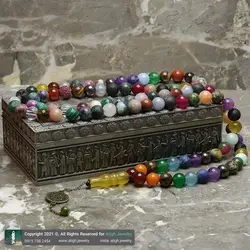 تسبیح و گردنبند لوکس احجار الشفا 43 نوع سنگ، هفت سنگ چاکرا، حدید محافظ هاله انرژی 101 دانه دستساز با شیخک عقیق زرد حکاکی شرف الشمس و تک مهره یشم معدنی