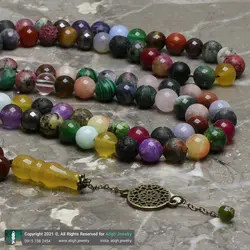 تسبیح و گردنبند لوکس احجار الشفا 43 نوع سنگ، هفت سنگ چاکرا، حدید محافظ هاله انرژی 101 دانه دستساز با شیخک عقیق زرد حکاکی شرف الشمس و تک مهره یشم معدنی