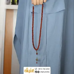 تسبیح عقیق سرخ معدنی ۶۶ دانه درشت دستساز بسیار خوشرنگ طراحی اسلیمی
