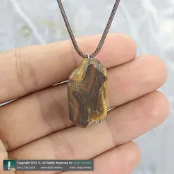 گردنبند چشم ببر راف ( تراش نخورده) معدنی با بازی نور زیبا همراه بند چرمی تخصصی چاکرا 2 و 3