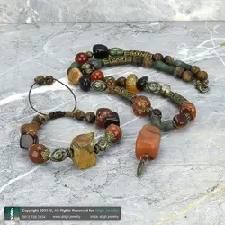 نیم ست گردنبند و دستبند ترکیب مهره لول عقیق سلیمانی، شاه مقصود، عقیق سلیمانی و سیاه نامنظم، عقیق تبتی، چشم ببر راف و تراش استار معدنی