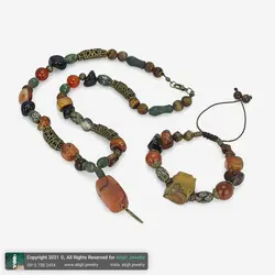 نیم ست گردنبند و دستبند ترکیب مهره لول عقیق سلیمانی، شاه مقصود، عقیق سلیمانی و سیاه نامنظم، عقیق تبتی، چشم ببر راف و تراش استار معدنی