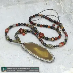 گردنبند تمام سنگ اسلایس عقیق سلیمانی خردلی دور نگین، همراه عقیق تبتی چشمی و عقیق سلیمانی انواع تراش معدنی بافت