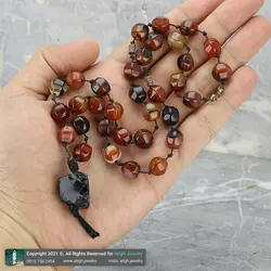 تسبیح کلکسیونی عقیق سلیمانی مشکی قهوه ای تراش چند وجهی همراه شیخک راف تورمالین سیاه معدنی بافت گره ای 33 دانه دستساز