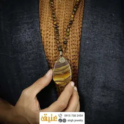 سینه ریز چشم ببر معدنی با بازی نور محصورکننده، بسیار مرغوب با نقوش منحصر به فرد بافت گره ای