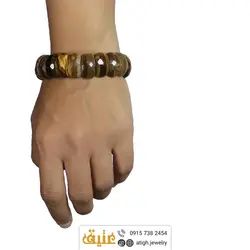 دستبند چشم ببر طبیعی تراش دار سنگ درمانی‌