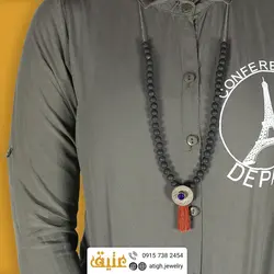 سینه ریز سکه عقیق آتشفشانی همراه منگوله ابریشمی‌