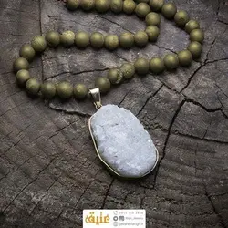 سینه ریز کوارتز تیتانیوم و پیریت طلایی