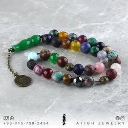 تسبیح احجار الشفاء (سنگ درمانی)، هفت سنگ چاکرا و محافظ هاله انرژی ۳۳ دانه شیخک عقیق سبز معدنی سری بینظیر سنگ های کمیاب ۳۴ نوع سنگ آویز سکه