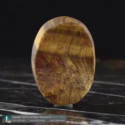 نگین چشم ببر طبیعی تراش نخورده کیفیت بالا بازی نور و رنگ زیبا تخصصی سنگ درمانی