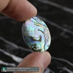 نگین صدف آبالون هفت رنگ طبیعی کیفیت بالا بازی نور و رنگ زیبا رگه های منحصر به فرد تخصصی سنگ درمانی وزن حدود 5 گرم