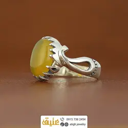 انگشتر عقیق زرد شرف الشمس خوشرنگ معدنی تراش دامله رکاب نقره دور چنگ اشکی