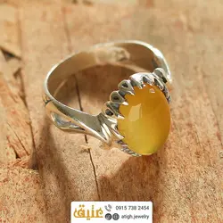 انگشتر عقیق زرد شرف الشمس خوشرنگ معدنی تراش دامله رکاب نقره دور چنگ اشکی