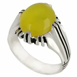 انگشتر عقیق زرد شرف الشمس خوشرنگ معدنی تراش دامله بیضی رکاب ۴ چنگ سیاه قلم شیاردار نقره ۹۲۵ عیار